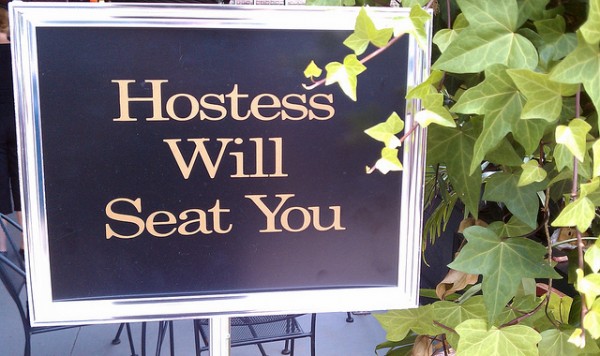 Hostess will seat you sign: patience